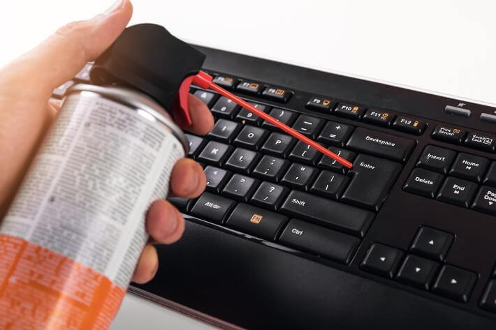 keyboard cleaning with air canister